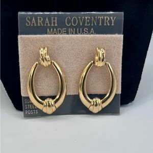 Vintage Sarah Coventry gold tone earrings. Long hoop style with posts. O…​​
